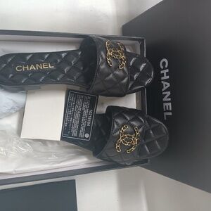 Brand New Chanel Black Chain Gold Logo Quilted Mules